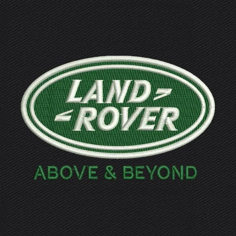 Land Rover logotipo por encima y más allá